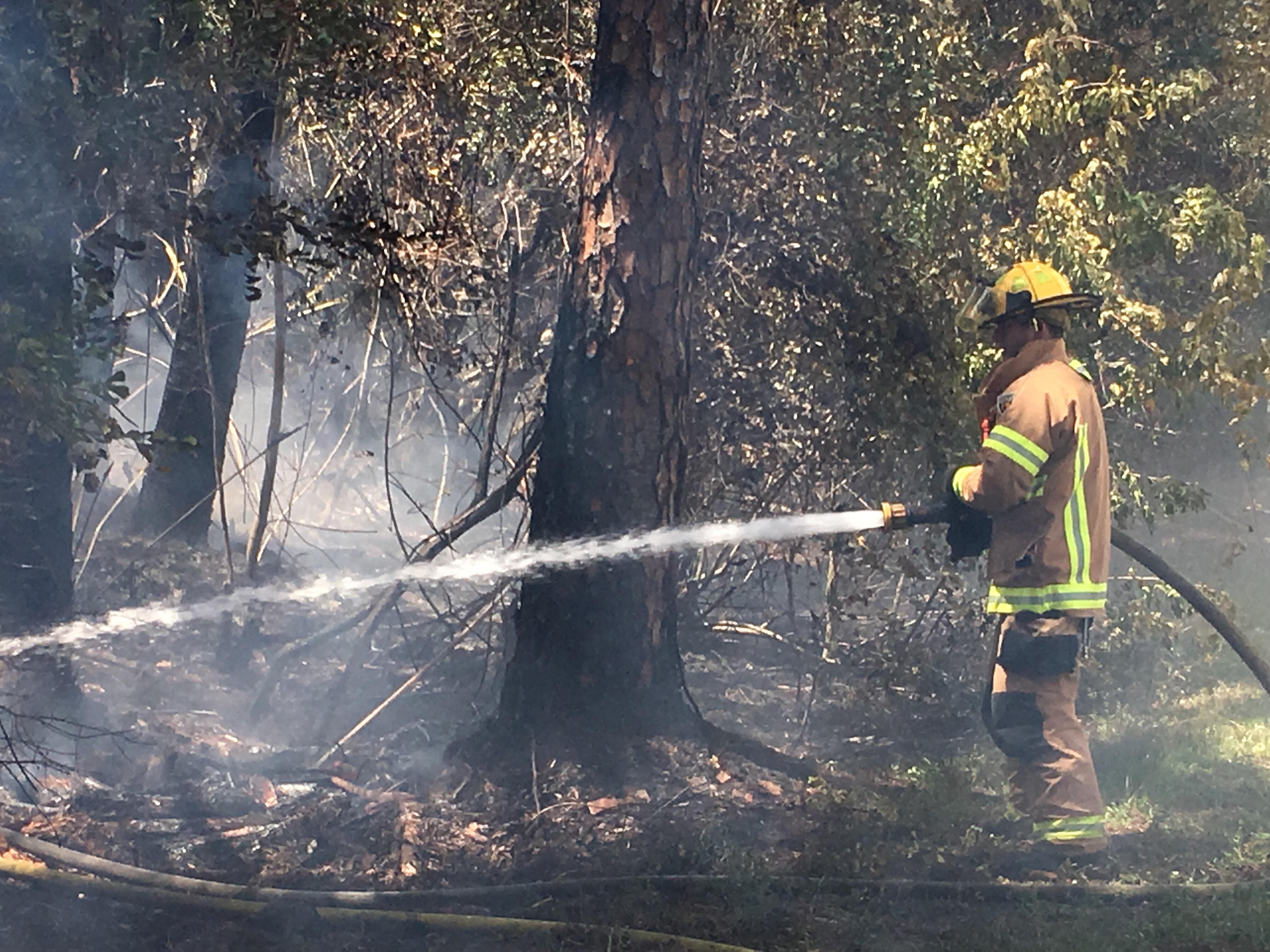 Evacuation lifted; brush fire out, officials say Vero News