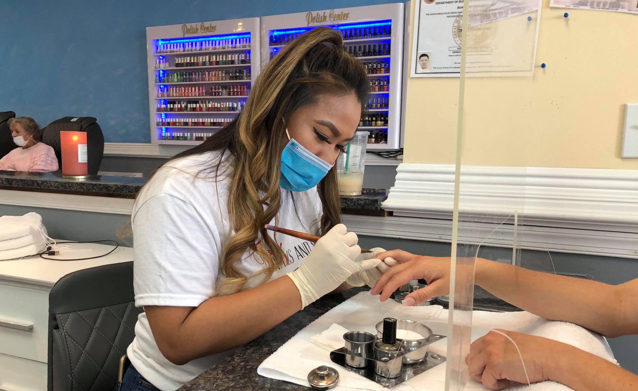 Customers mask up, get polished as salons reopen - Vero News