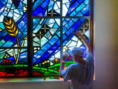 Christ by the Sea reinstalls windows shattered by vandal