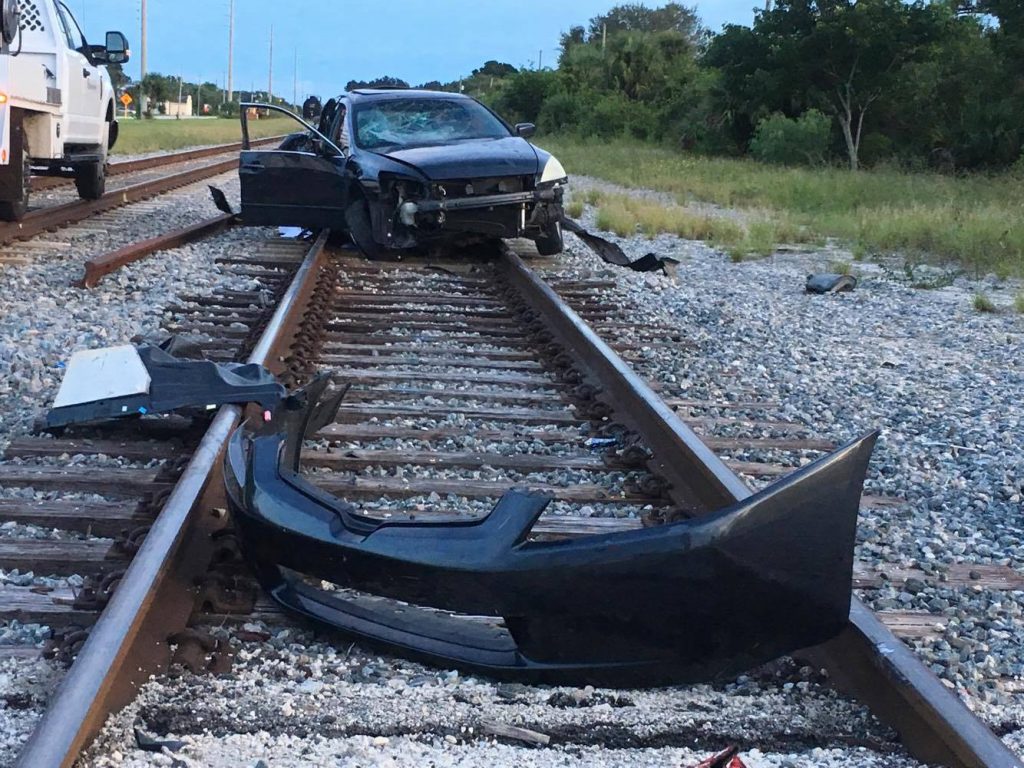 Freight train hits car in Gifford - Vero News