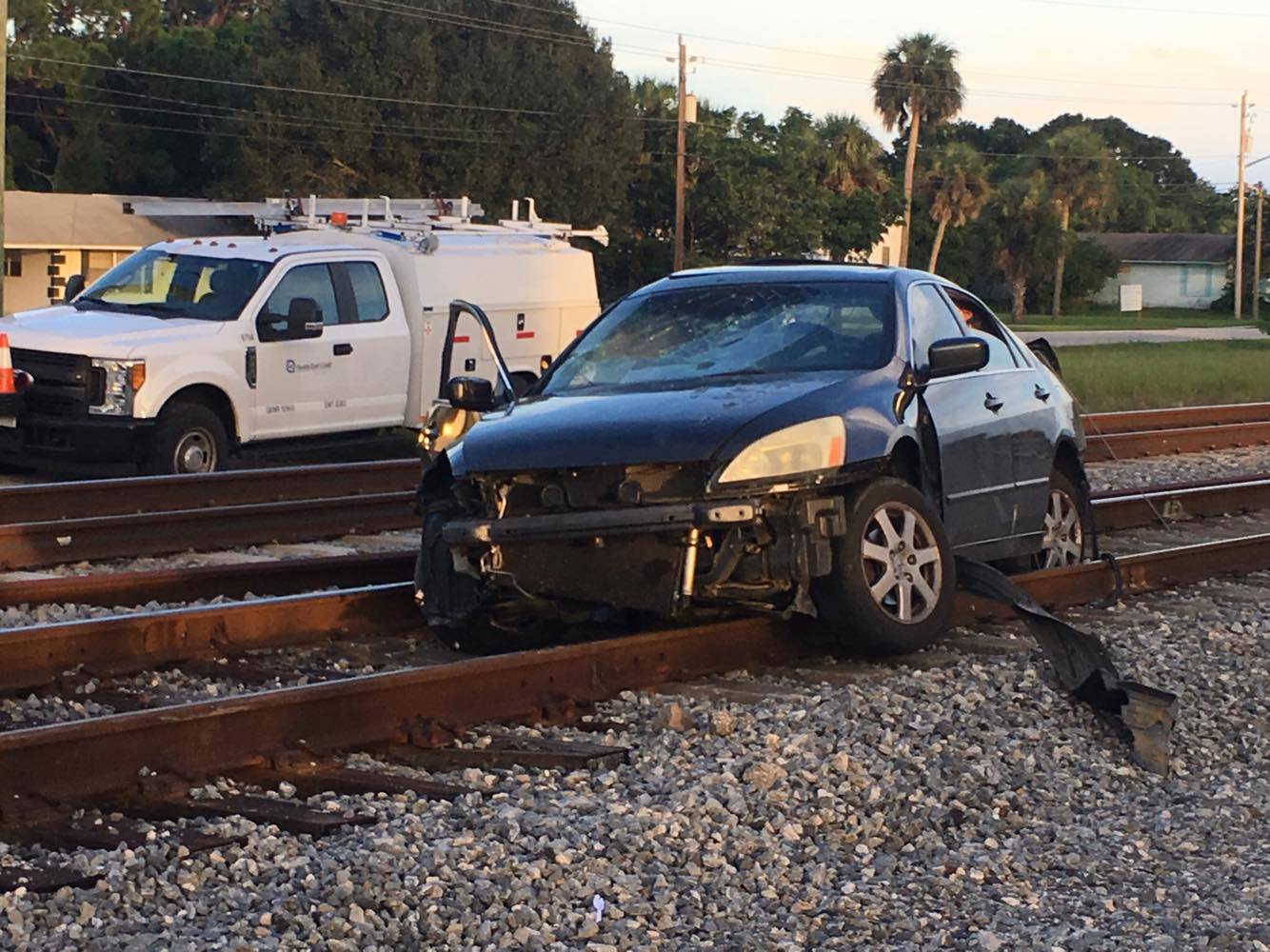 Freight train hits car in Gifford - Vero News