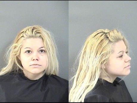 Woman arrested on grand theft charge