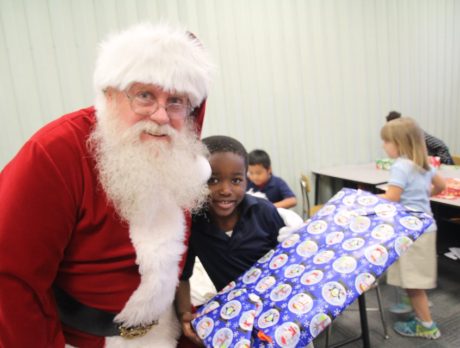 Photos – Santa gives gifts to students at GYAC