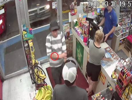 Photos – Police search for man, person of interest in gas station theft