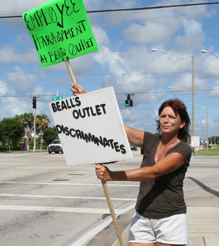 Former Bealls Outlet employees protest against local store