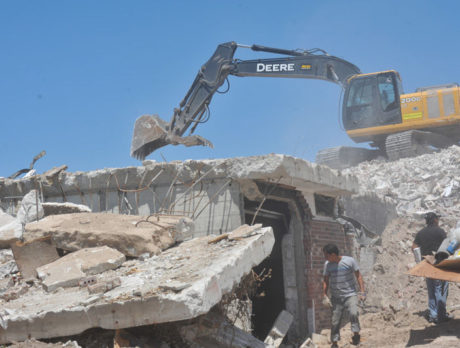 Clouds of dust temporarily halt Surf Club demolition