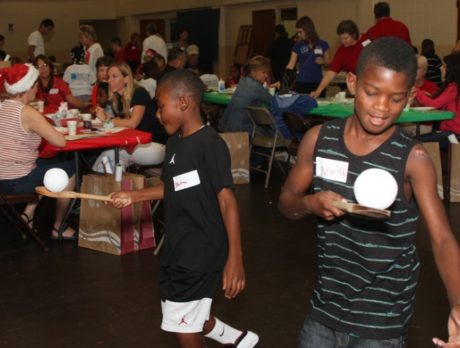 Volunteers help make holidays bright for Youth Guidance kids