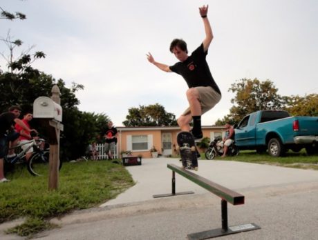 Working on grinding in his driveway