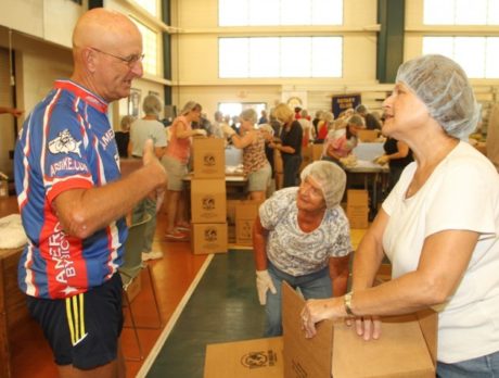 Ride to Beat Hunger ends with packing 100,000 meals for Haiti children