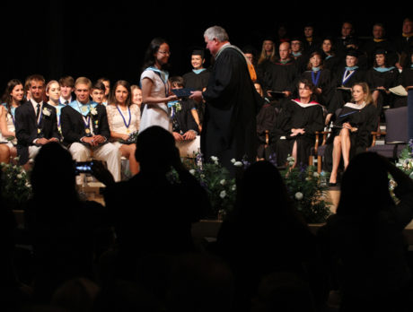 58 Saint Edward’s grads claim diploma, new start