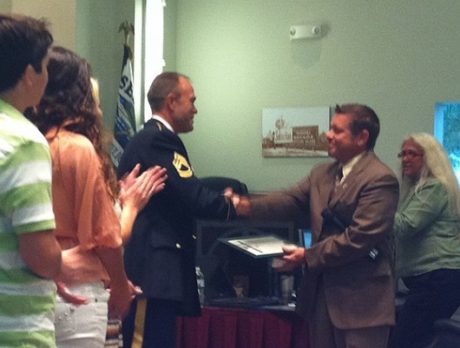 Sgt. First Class Hamilton McWhorter receives a proclamation