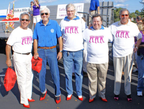 Indian River Exchangites walk in red stilettos for SafeSpace