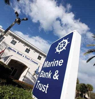 Marine Bank now fighting state as well as federal regulators