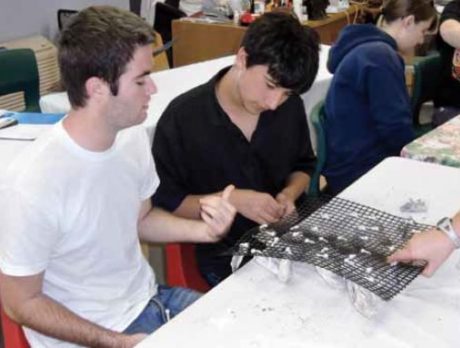 Students at Indian River Charter make oyster mats for reefs