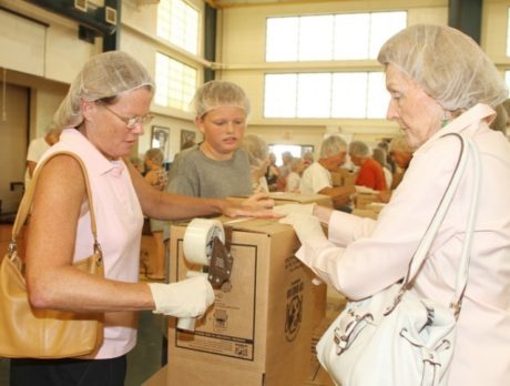 Packaging 100,000 nutritious meals for hungry children