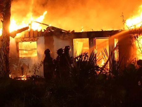 Fire engulfs house on 66th Ave.