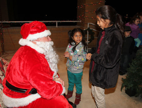 Santa greets children at Old Fellsmere School