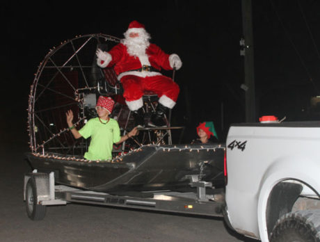 Santa trades reindeer for airboat to visit Fellsmere children