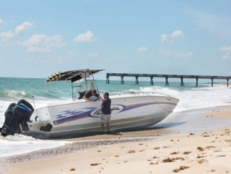 Customs, police check out beached boat near Seaquay in Vero Beach