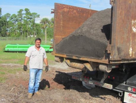 Companies donate time, equipment, compost for gardening project