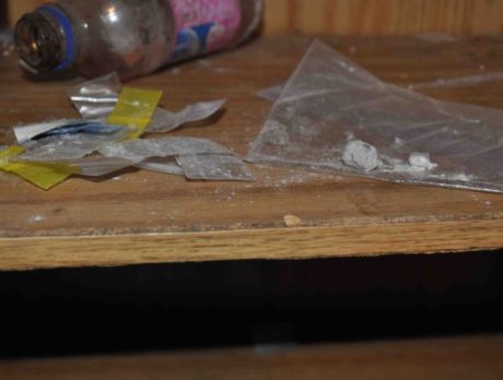 Narcotics search warrant yields heroin, meth, gun