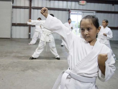 Kids develop confidence through karate at Operation Hope