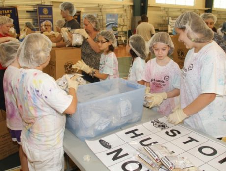 Packaging 100,000 nutritious meals for hungry children