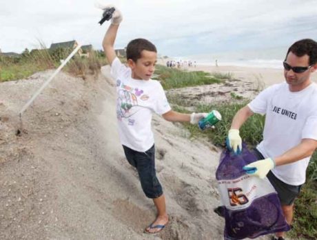 Volunteers roll up their sleeves to help others through United Way Day of Caring