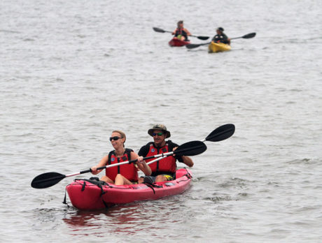 Justin Riney paddles into Sebastian to promote Indian River Lagoon