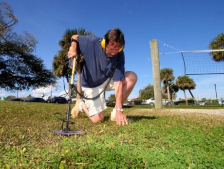 Digging up his find