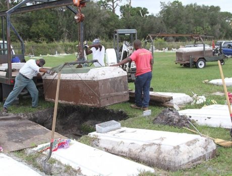 Work underway to rebury unearthed vaults at Gifford Cemetery