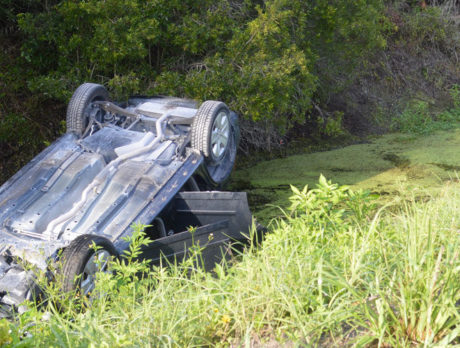 Unoccupied vehicle found overturned in canal