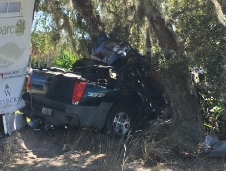 Man dies after truck strikes tree; IR Blvd open