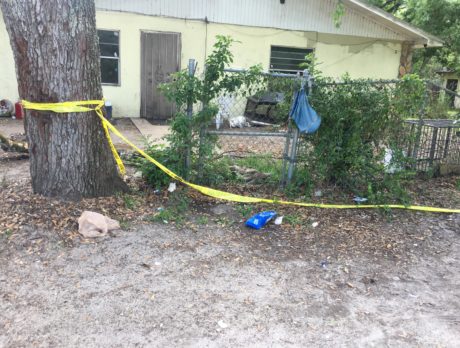 Body found buried in yard during search for drugs, guns