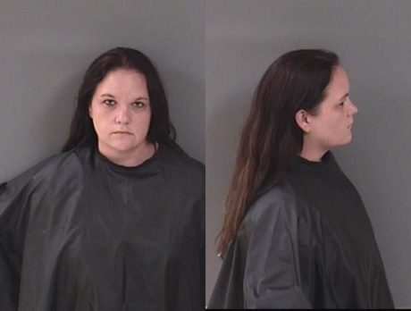 Toddler with soiled diaper found wandering dirt road; woman charged