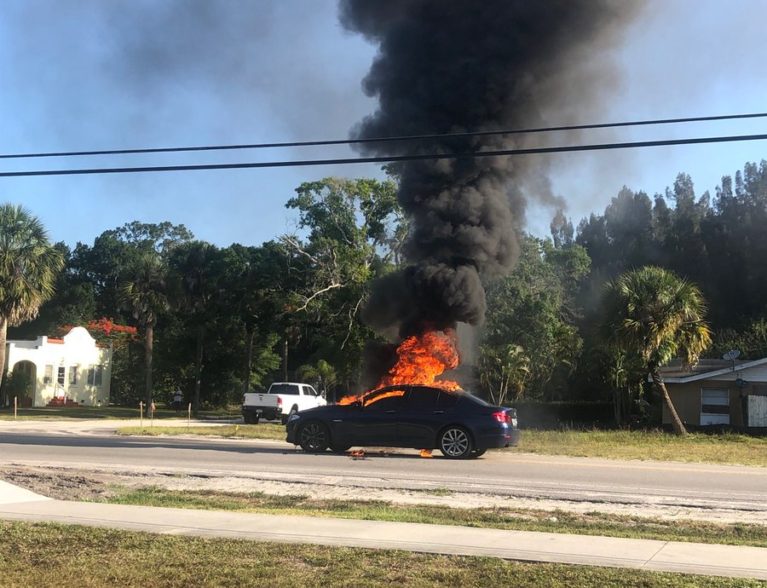 Bystander pulls man from flaming car; man severely burned