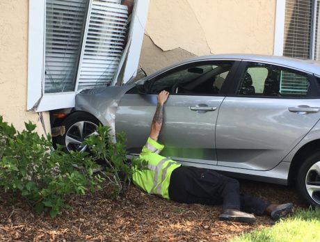 No injuries after car slams into empty apartment unit
