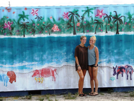 St. Ed’s students keep aid flowing to Bahamas in colorful cargo container