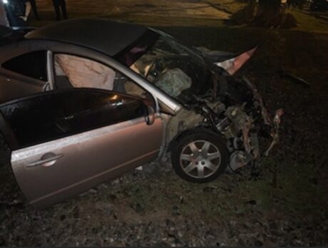 Two men escape injuries after train collides with car