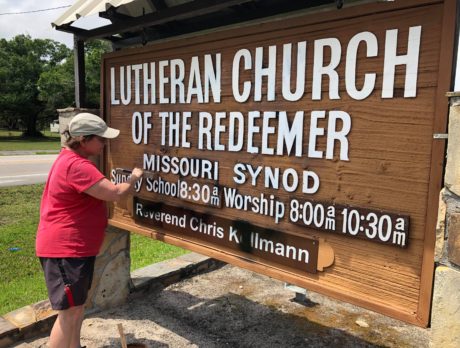 Churches repaint after profane graffiti sprayed on sign, buildings