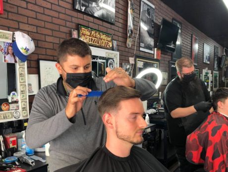 ‘We’re open’ – Barbers welcome back customers
