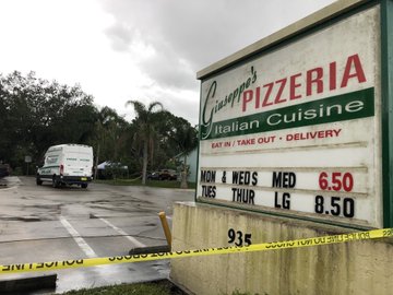 Employee with assault rifle fires shots in eatery, kills 1