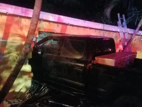 2 critical after truck strikes car, house bedroom; man charged