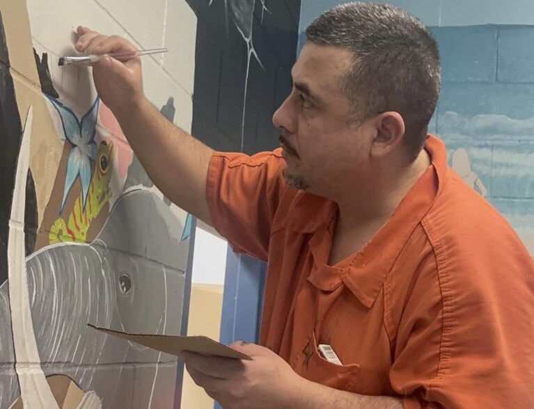 Inmates draw life lessons from painting new mural at IRC Jail