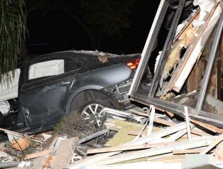 Deputies: Woman drove car through entire home to the backyard