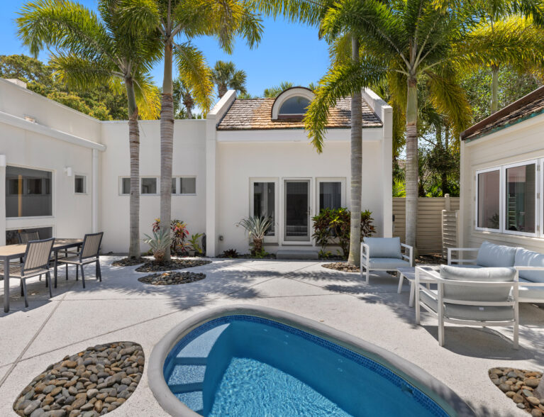 Villa in peaceful Baytree community features courtyard and cabana