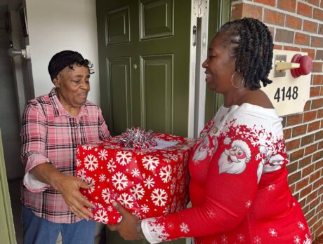 Ms. Claus, elves deliver meals, gifts to seniors in community