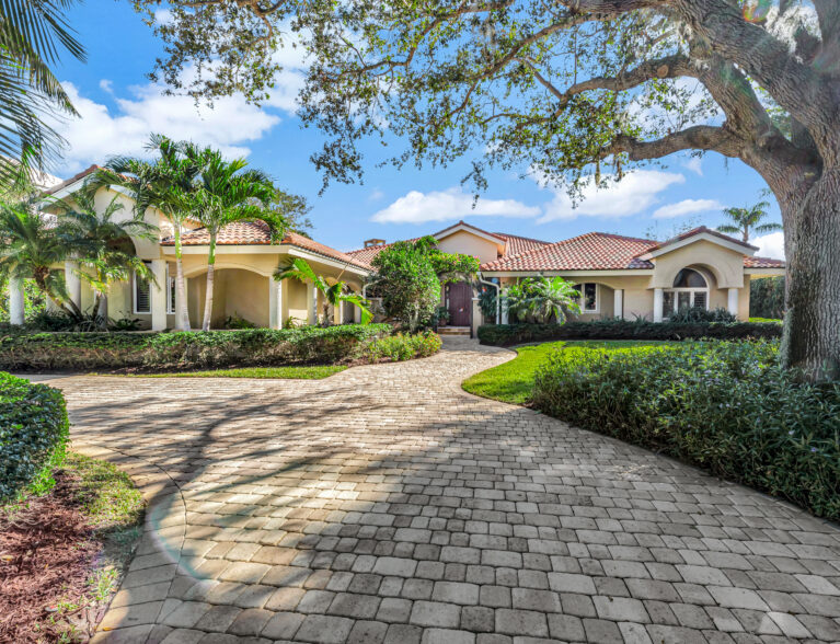 Shores home has sunset views and deep-water dock