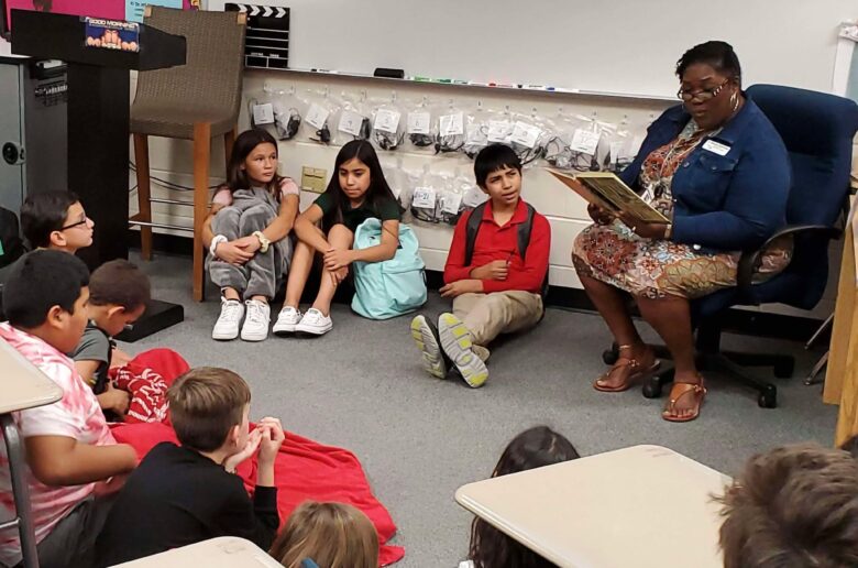 ‘Touching lives’: Educator honored for 40 years of service, building relationships
