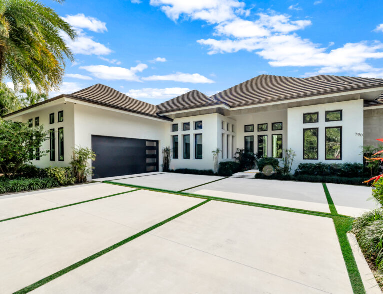 European design and fine finishes distinguish Riomar Bay II home